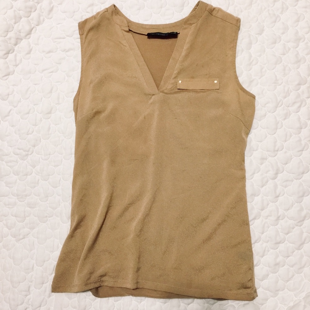 The limited sparkling golden tan top